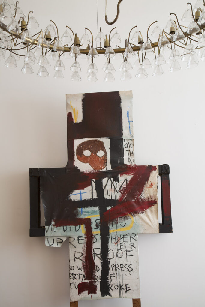 Painting by Jean-Michel Basquiat and Chandelier by Vilhelm Lauritzen.