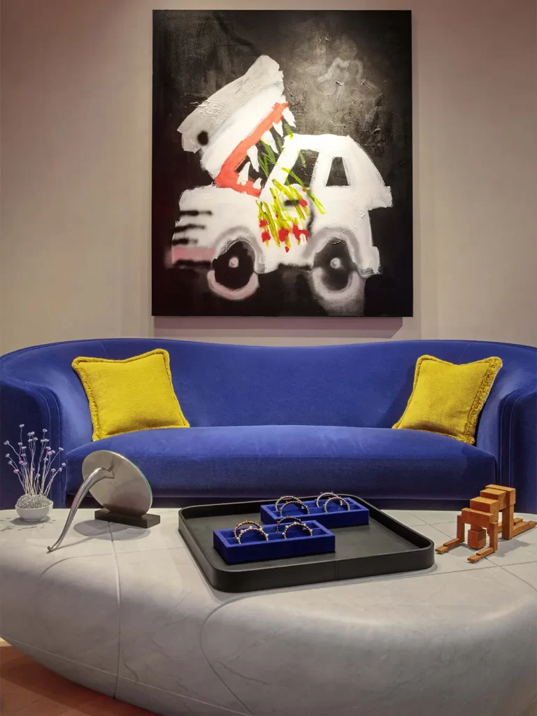 Lounge room featuring painting by Robert Nava.